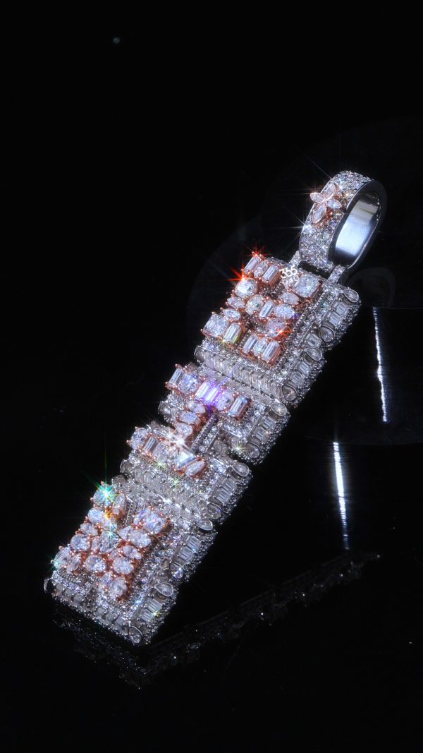 Vertical Pendant with Emerald Side Detailing & Pear-Cut Shine