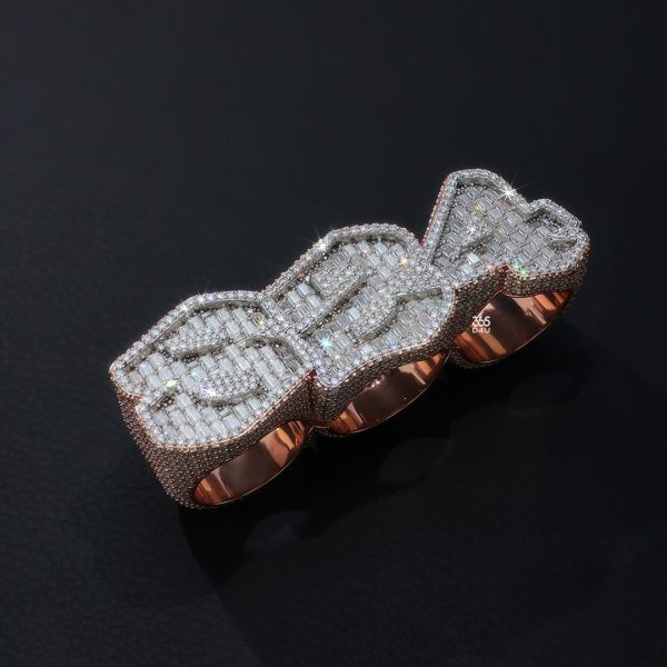 824 Three-Finger Ring with Emerald-Cut Stones